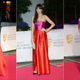 Image for article titled Lots of Red, Charming Crocs, & Strange Headgear at the TV BAFTA Awards